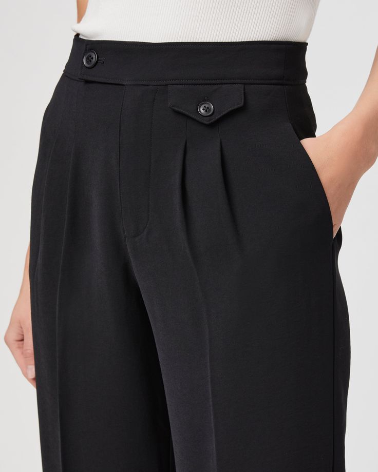 Meet the Brigida Pant, our new wide leg classic trouser, perfect for an effortlessly cool everyday look. Featuring front pleats and button waist detailing with a front mini pocket, this high waisted black pant can be worn with sneakers for daytime or dressed up with heels for a night out. | Brigida Pant - Black | Size 2 Classic Wide-leg Pants With Pleated Waist, Timeless Semi-formal Wide Leg Bottoms, Semi-formal Wide-leg Dress Pants With Pockets, Classic Semi-formal Bottoms With Button Closure, Classic Workwear Bottoms With Button Cuffs, Elegant Straight Leg Culottes For Formal Occasions, Semi-formal Wide-leg Pants With Pockets, Formal Wide-leg Pants With Pleated Waist, Classic Wide Leg Culottes