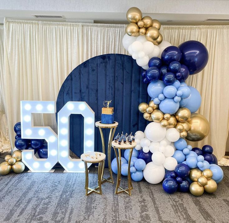 a 50th birthday party with balloons and decorations