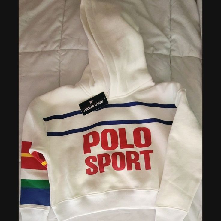 Polo Ralph Lauren Crop Top Hoodie For Lil Girls White Hoodie Top, Trendy White Sports Hoodie, Sporty White Top With Drawstring Hood, Sporty Ralph Lauren Tops With Graphic Print, White Fleece Top With Graphic Print, Sporty Graphic Print Tops By Ralph Lauren, White Sporty Top With Drawstring Hood, White Fleece Top With Logo Print, Ralph Lauren Purple Sports Hoodie Women