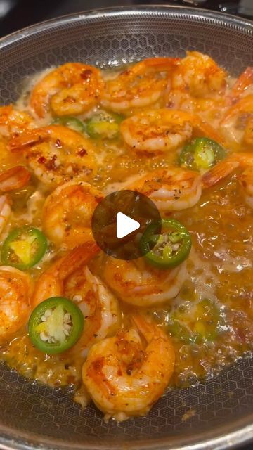 shrimp and jalapeno soup being cooked in a pan on the stove top