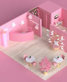 an aerial view of a pink room with tables and chairs