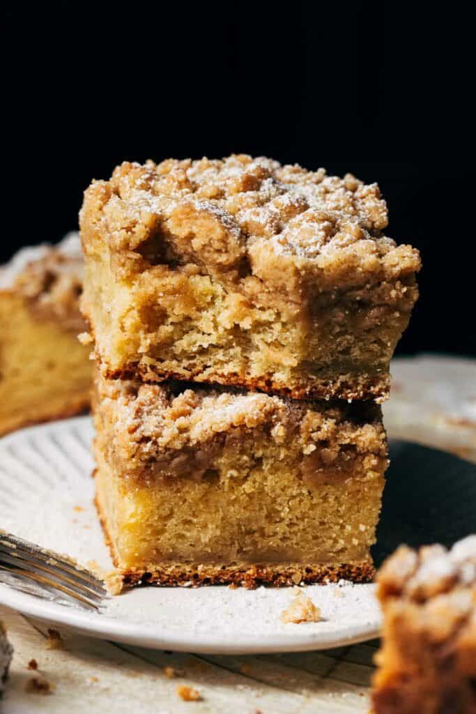 three pieces of cake sitting on top of a white plate