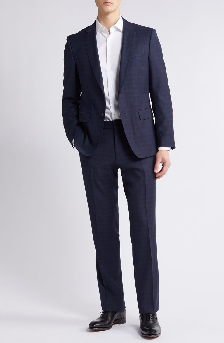 Patterned in a pale plaid, this suit tailored from heathered wool features classic detailing and softer construction for comfort during formal occasions. Jacket has notched lapels; four-button cuffs; chest pocket; welt pockets; side vents Trousers have zip fly with button-tab closure; slant pockets; back button-welt pockets Jacket is partially lined 100% virgin wool Spot clean Made in Turkey Tailored Plaid Suit With Concealed Placket, Plaid Wool Suit With Notch Lapel, Plaid Wool Suit With Concealed Placket, Plaid Wool Suits With Concealed Placket, Plaid Suit With Concealed Placket For Workwear, Timeless Plaid Suit For Work, Timeless Plaid Suits For Work, Business Plaid Suit With Hidden Button Closure, Timeless Plaid Suit With Notch Lapel