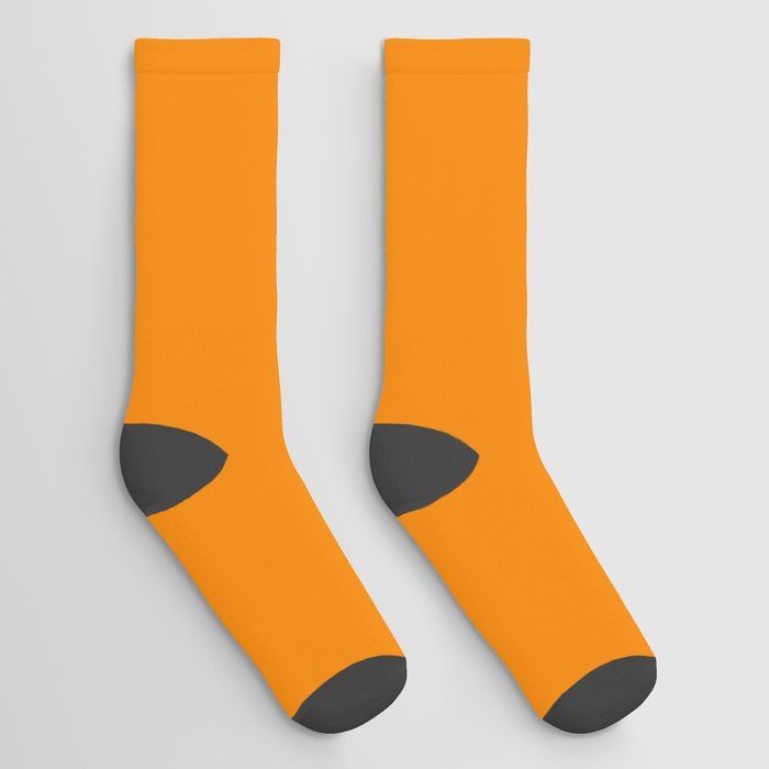 Our socks help you express your personality all the way down to your toes. The seamless design and unique printing process means your favorite design will appear in vivid color without any base color peeking through. Plus, they are made from a soft cotton/poly blend for stretch and comfort--one size fits most. Available in one, two or three pair sets.  Keywords: Brown, Amber, Yellow, Peach, Pattern, Font, Event, Magenta.  Also called: Beige Socks, Cream Socks, Brown Socks, Orange Socks, Yellow Socks, Peach Pattern, Solid Socks, Bright Pastels, Gradient Design