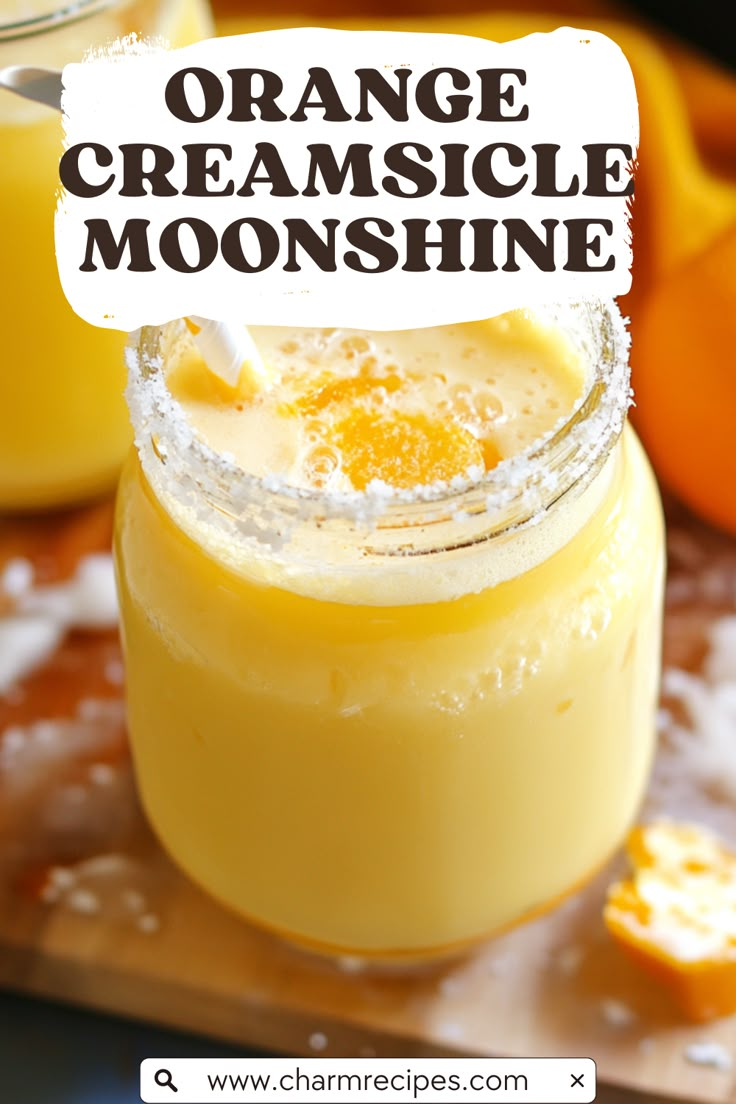 an orange creamsice smoothie in a mason jar