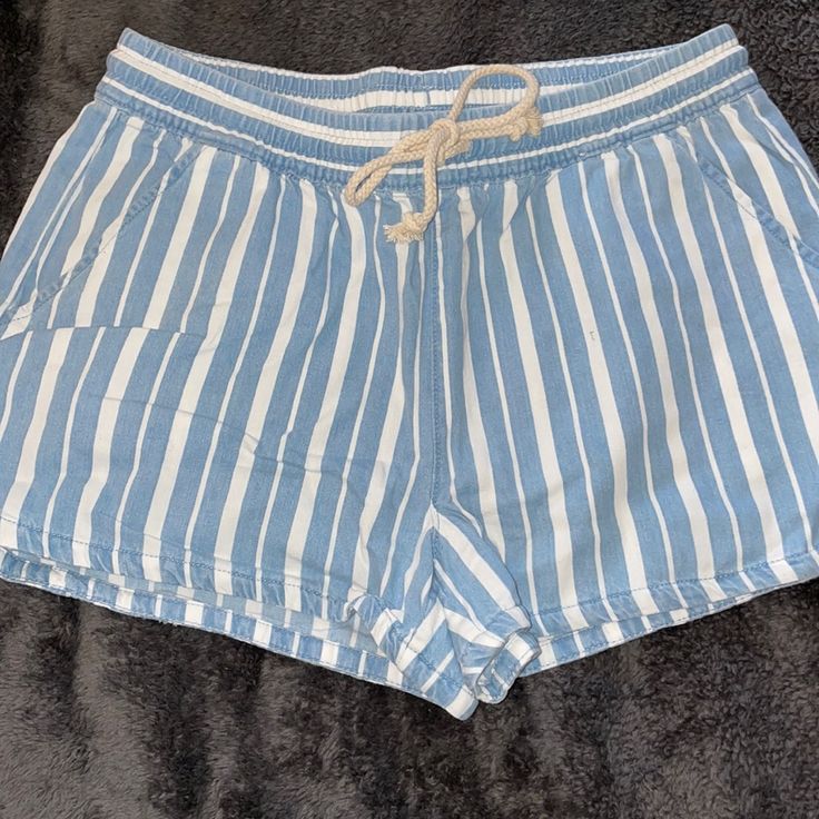 Nwt Size Small Aerie Shorts Canvas-Ish Material Blue And White Stripes With Cute Corded String Tie Perfect Condition Blue Beachy Cotton Bottoms, Beachy Blue Cotton Bottoms, Beachy Blue Bottoms For Day Out, Aerie Shorts, White Stripe, Blue White, High Waist, Color Blue, Blue And White