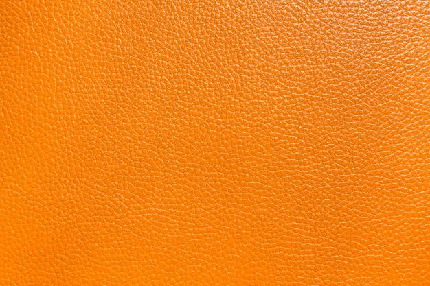 an orange leather texture background or texture