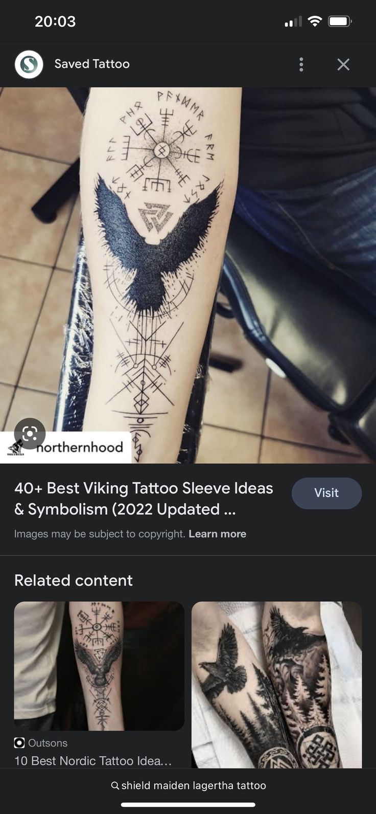 an image of some tattoos on someone's leg