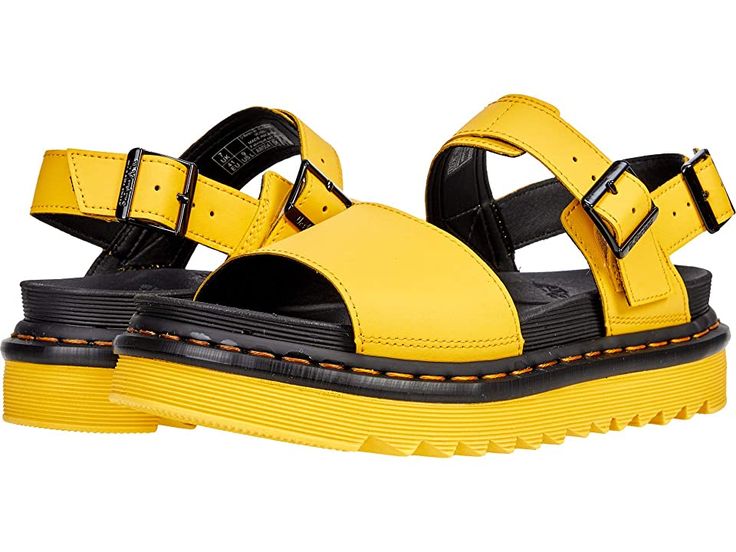 Dr. Martens Voss - Women's Sandals : Yellow : The Dr. Martens Voss sandal has a smooth, sleek style that will be a standout this summer! Soft Hydro leather or Brando leather upper. Two leather straps with adjustable metal buckles. Goodyear® welted construction provides durability with an upper and sole that are heat-sealed and sewn together. Soft, breathable man-made lining. Lightly cushioned man-made footbed provides underfoot comfort and support. Built on the super-lightweight Ziggy outsole wi Strapped Sandals With Leather Footbed For Summer, Strapped Synthetic Sandals For Summer, Spring Leather Sport Sandals With Removable Insole, Leather Sport Sandals With Removable Insole For Spring, Yellow Slingback Sandals With Removable Insole, Casual Strapped Sandals With Leather Footbed, Leather Slingback Sport Sandals With Adjustable Straps, Leather Strap Sandals For Summer, Casual Strapped Sandals With Buckle Closure