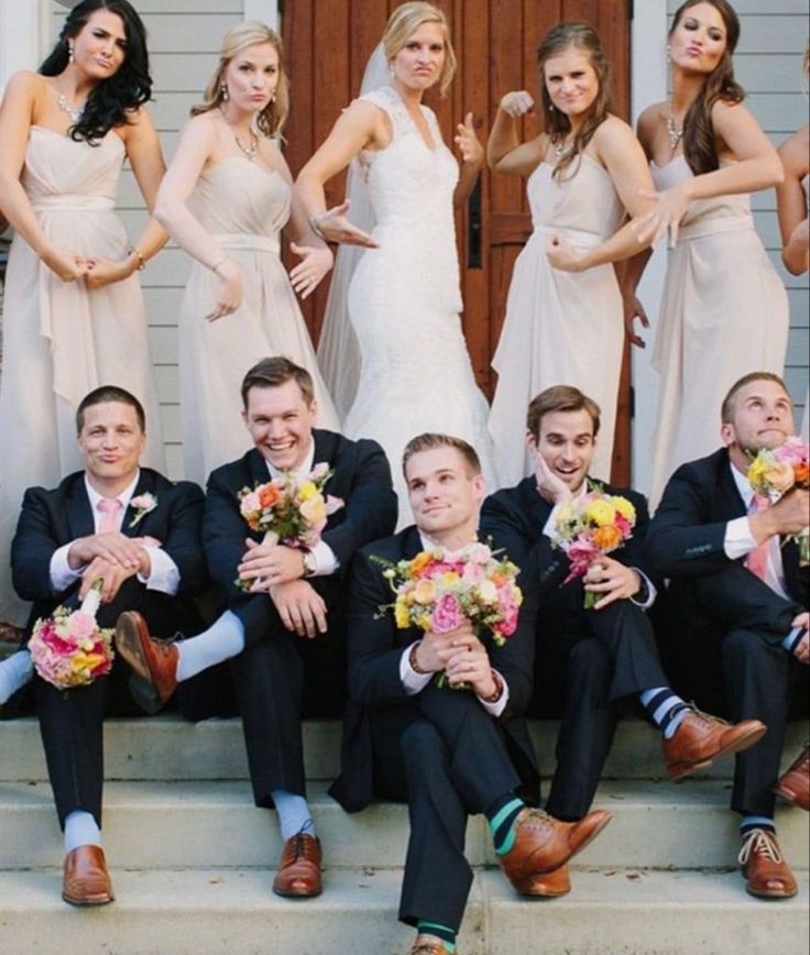 a group of people that are sitting on steps