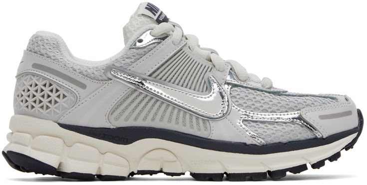 Low-top mesh and rubberized sneakers in gray. Metallic silver-tone trim throughout. · Lace-up closure · Padded tongue and collar · Signature Swoosh appliqué at sides · Cushlon foam rubber midsole · Treaded rubber outsole Please note that this item may be shipped only within North America. Supplier color: Photon dust/Chrome/Gridiron Silver Sneakers With Rubber Sole For Light Sports, Silver Low-top Running Shoes With Rubber Sole, Sporty Silver Sneakers With Translucent Outsole, Silver Sneakers With Rubber Sole For Streetwear, Silver Low-top Sneakers With Translucent Outsole, Gray Sporty Sneakers With Perforations, Sporty Gray Sneakers With Perforations, Silver Sneakers With Translucent Outsole For Sports, Sporty Silver Running Shoes With Translucent Outsole