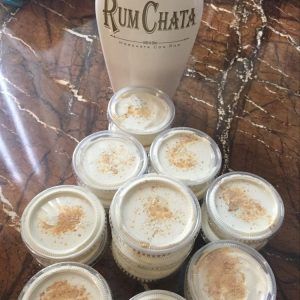 there are many cups that have been placed on the table with rumchata in them