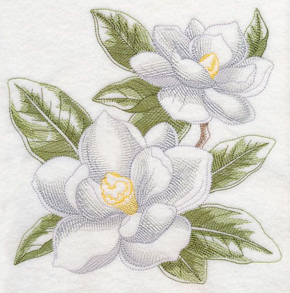 two white flowers with green leaves are on the towel that is embroidered onto it's side