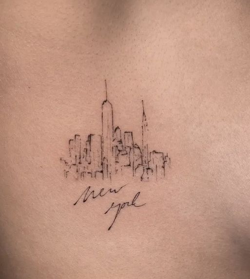 a cityscape with the word new york written in cursive ink