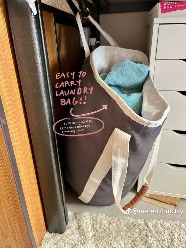 an empty laundry bag sitting in the corner of a closet