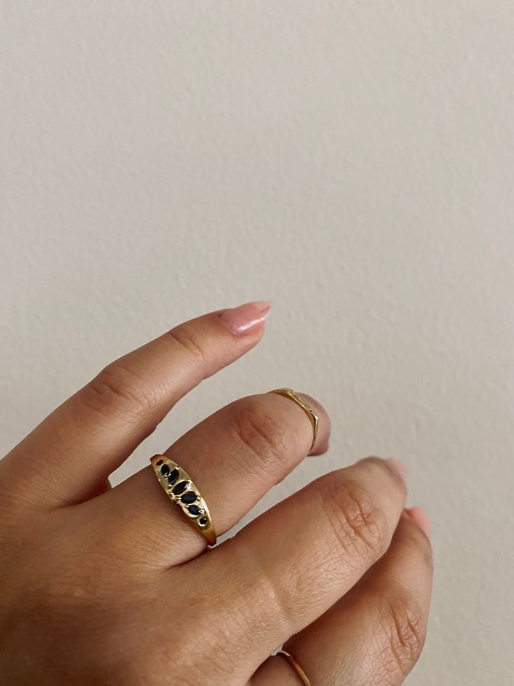 Can you see the crown again in this dark beauty of a signet ring? The Dark Gaea features marquise and round conflict-free black diamonds measuring 1.2mm - 3.5mm. The solid gold signet ring is 5mm wide, tapers to 1.25mm and is approximately 1mm thick. Find us diamond babes w Anastassia Sel at our boutique. Classic Black Spinel Promise Ring, Classic Black Spinel Ring, Classic Jewelry Ring With Black Diamonds, Classic Black Diamond Ring Jewelry, Timeless Black Rings With Rose Cut Diamonds, Timeless Black Ring With Rose Cut Diamonds, Classic Sapphire Ring With Black Spinel For Promise, Classic Black Spinel Ring With Black Diamonds, Fine Jewelry Black Diamond Promise Ring