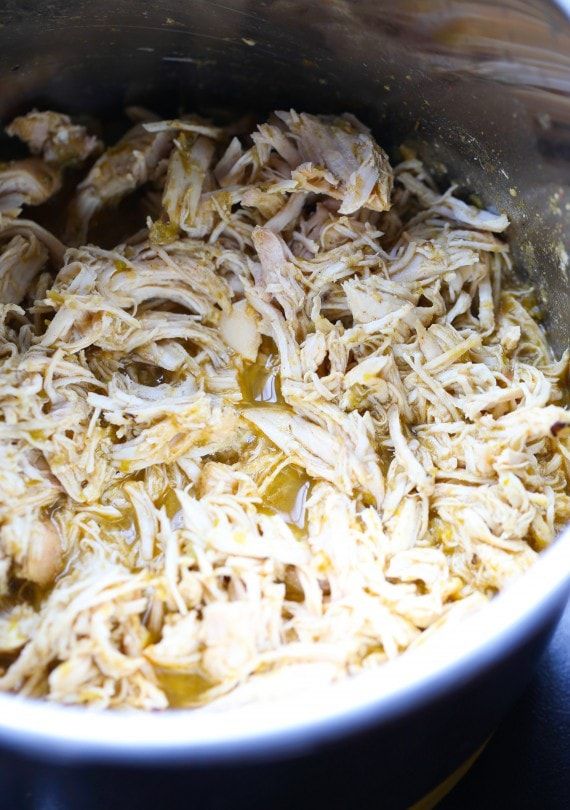 the food is being cooked in the pot on the stove