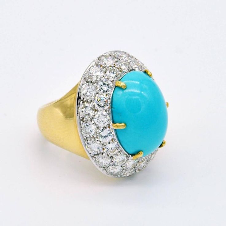 Women's Large Turquoise Diamond Gold Cocktail Ring For Sale Luxury Turquoise Gemstone Ring, Luxury Turquoise Cabochon Ring In Yellow Gold, Luxury Yellow Gold Turquoise Cabochon Ring, Luxury Oval Turquoise Ring, Luxury Turquoise Diamond Ring, Turquoise Diamond Ring With Center Stone, Luxury Oval Turquoise Gemstone Ring, Luxury Yellow Gold Turquoise Ring For Formal Occasions, Luxury Turquoise Diamond Ring As Gift