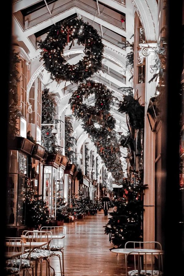 the inside of a building decorated for christmas