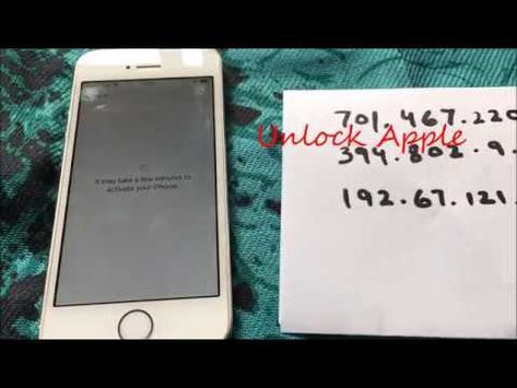 an iphone is sitting next to a note that says unlock apple 31 / 012