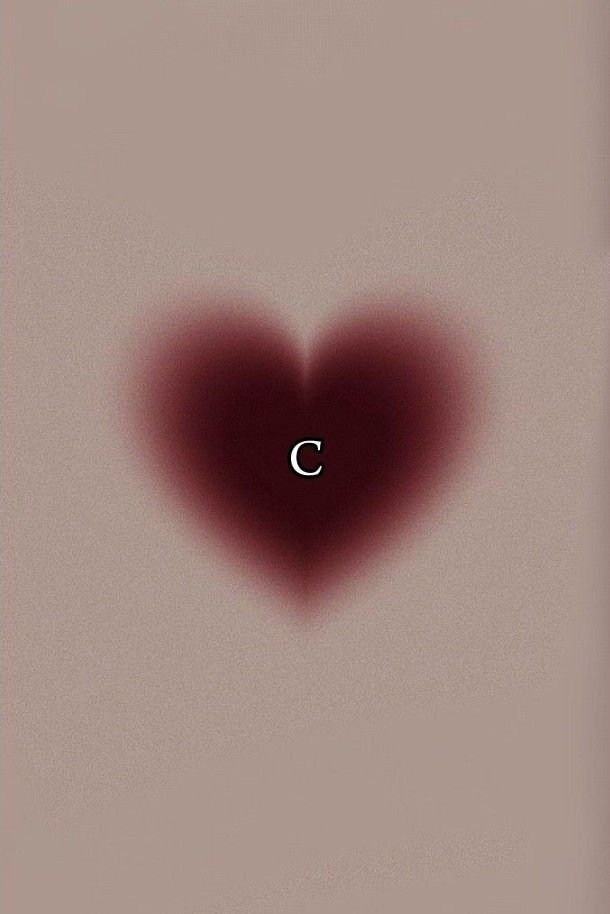 a heart shaped object with the letter c on it