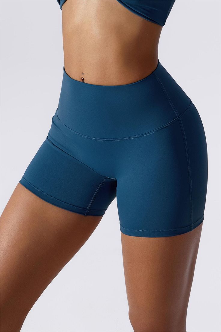 Dare to move with confidence in our No Front Seam Butt Sculpting Shorts. Get ready to shape and define your curves with their compression waistband and bum sculpting technology. Feel superior comfort and flexibility to tackle any workout or activity you can dream up! Take on the world - these active shorts are sure to amaze! Features: High waisted fit No front seam Compression waistband Sweat and squat proof Tight cut to the body Bum sculpting to lift the glutes Fabric: Naked Sensation fabric Sk High Waist Bottoms With Built-in Shorts For Pilates, High Waist Sculpting Yoga Pants, High Stretch Breathable Blue Shorts, Bottoms With Built-in Padding For Pilates, Workout Shapewear Bottoms With Built-in Shorts, Solid Bottoms With Built-in Padding For Pilates, High Stretch Elastane Shorts For Pilates, Sculpting Yoga Bottoms With Contoured Waistband, Compression Biker Shorts With Contoured Waistband For Pilates