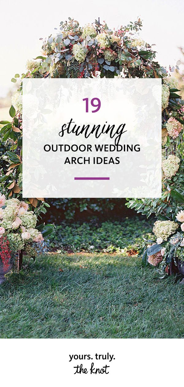 an outdoor wedding arch with flowers and greenery in the background text reads, 19 stunning outdoor wedding arch ideas