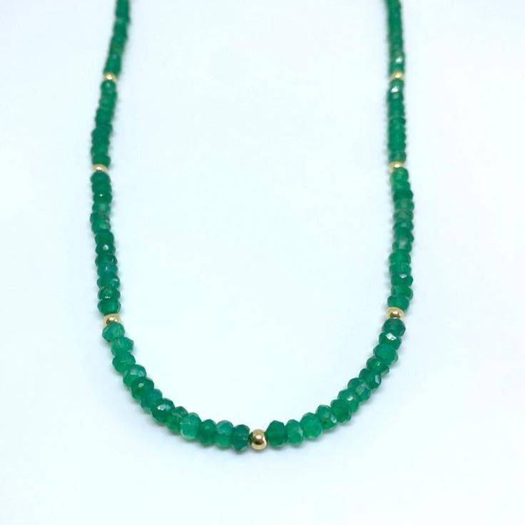 Crafted from genuine green onyx, this classic necklace is sure to add elegance to any look. The soft tones of the green stone will bring an exquisite accent to any necklace collection. Length 16" extender 1.5" Green Onyx represents growth, abundance, and material success. Green Onyx helps with centering during meditation, and for connecting with Higher powers. Heart Chakra. -This information is intended for spiritual support only- Beads 3x2mm Findings 14K GF Necklace Collection, Onyx Necklace, Classic Necklace, Green Onyx, Green Stone, Heart Chakra, Chakra, Onyx, Meditation