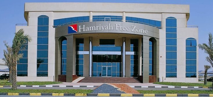 the front entrance to hamryah bee - zong's office building is shown