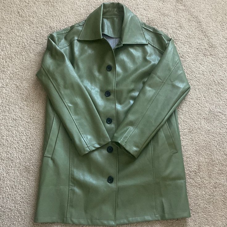 Cute Oversized Medium Green Pleather Jacket. Never Worn. Green Leather Jacket With Pockets For Spring, Green Leather Jacket For Spring Workwear, Green Leather Jacket For Work In Fall, Spring Leather Outerwear With Lapel Collar, Solid Leather Jacket With Snap Buttons For Fall, Spring Leather Single Breasted Outerwear, Leather Outerwear With Lapel Collar For Spring, Casual Green Leather Jacket For Work, Spring Single Breasted Leather Outerwear