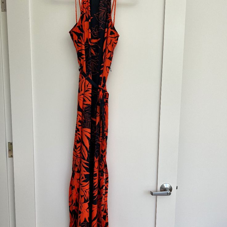 Donna Morgan Sleeveless Maxi Dress Size 6 Never Worn Dark Navy And Orange Sleeveless Maxi Dress With Orange Cord Halter Slits Both Sides And A Tie At The Waist Chic Orange Halter Neck Sleeveless Dress, Orange Sleeveless Maxi Dress For Beach, Red Sleeveless Maxi Dress With Side Slits, Orange Halter Neck Sleeveless Dress For Vacation, Casual Orange Halter Neck Maxi Dress, Sleeveless Orange Maxi Dress With Floral Print, Orange Sleeveless Maxi Dress With Floral Print, Sleeveless Orange Maxi Dress For Beach, Orange Sleeveless Maxi Dress For Vacation