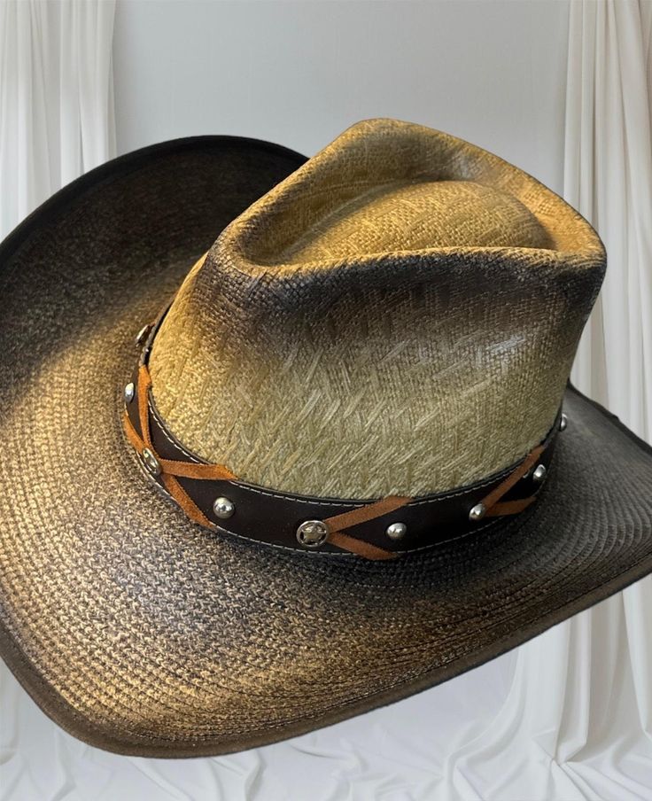 This cowboy hat captures the spirit of the West with its elegant design and sturdy structure. Made with high-quality materials, it offers comfort and durability. Ideal for any adventure or event, its classic style will make you stand out with an authentic and modern touch. 4 inch cup Wing 4 inches Western Style Concho Hats For Country Events, Wide Brim Concho Hat For Rodeo, Country Style Concho Hat For Rodeo, Western Hat With Concho And Curved Brim, Adjustable Fedora For Rodeo With Single Vent, Western Wide Brim Hat With Concho, Concho Hat With Curved Brim For Country Events, Western Style Adjustable Top Hat For Rodeo, Adjustable Western Top Hat For Country Events