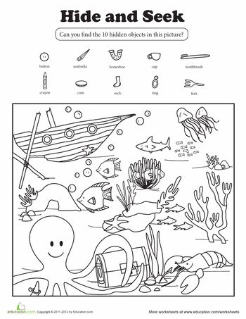 an ocean scene with the words hide and seek in black and white, including an octopus