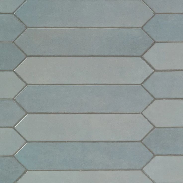 an image of a tile pattern that looks like hexagonal tiles