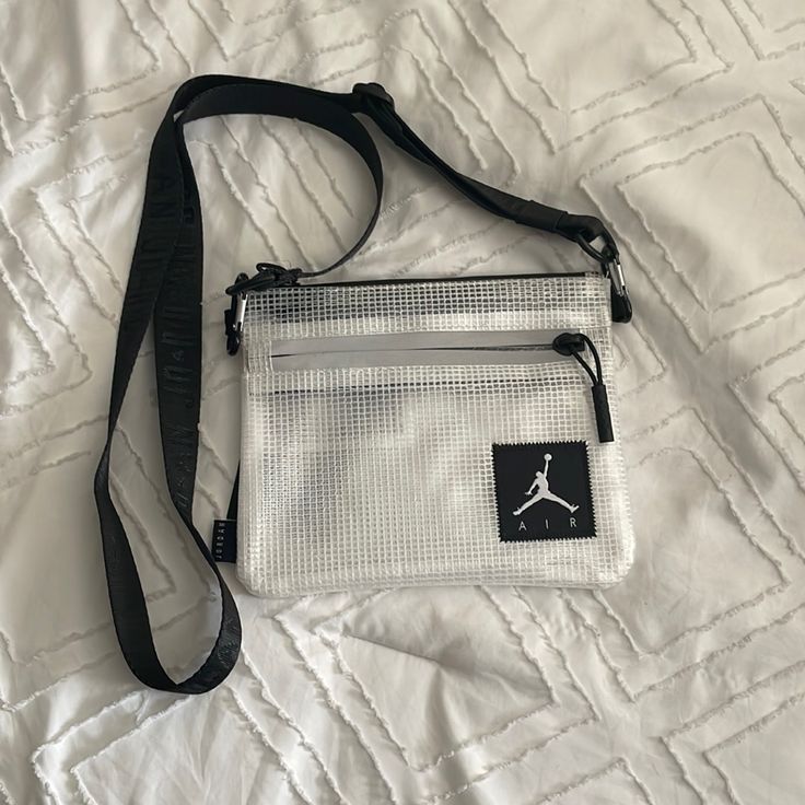 Nwt 6x7” Transparent Jordan Crossbody Bag; Black Adjustable Strap. Everyday Mesh Bags With Clear Strap, Clear Pouch Bag For On-the-go, Clear Nylon Bags For Everyday Use, Daily Use Mesh Bags With Clear Strap, Everyday Clear Nylon Bags, White Shoulder Bag With Clear Strap For On-the-go, Crossbody Bag Black, Womens Jordans, Crossbody Bags