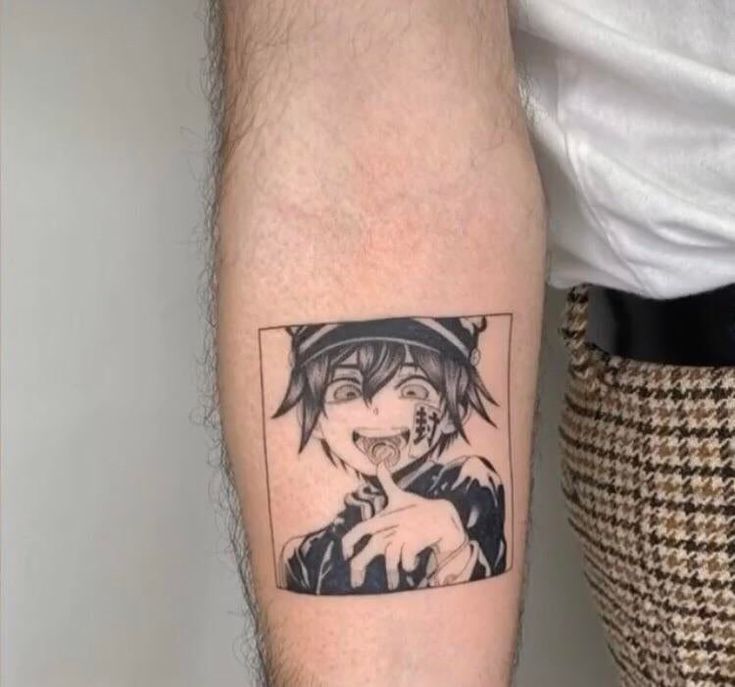 a person with a tattoo on their arm