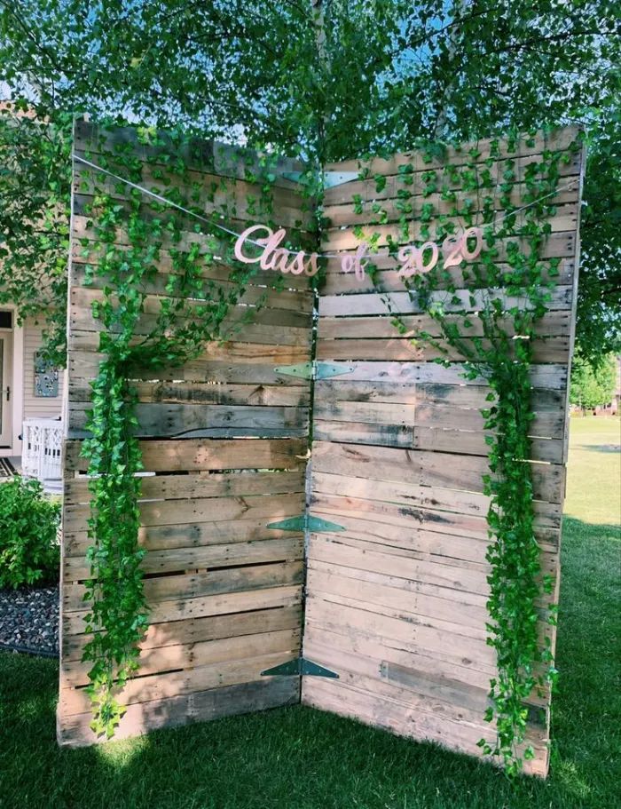 a wooden wall with vines growing on it