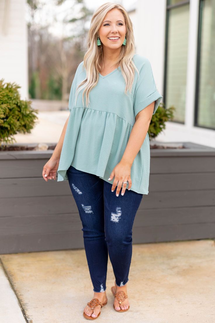 Expect many wide-eyed gazes when you're wearing this top! This top has a sleek design with a pretty aloe color you can dress up or down and style for every occasion! It's comfortable for all day wear, has a figure-flattering baby doll fit, and features the cutest cuffed-sleeves for the ultimate trendy look! Simply, style this top with skinnies and booties for an easy everyday outfit! 100% Polyester Model Fits, Everyday Outfit, Cuff Sleeves, Baby Doll, Everyday Outfits, Sleek Design, Baby Dolls, Dress Up, Sleek