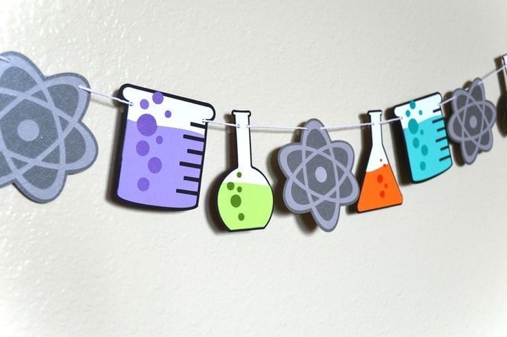 a science themed banner is hanging on the wall