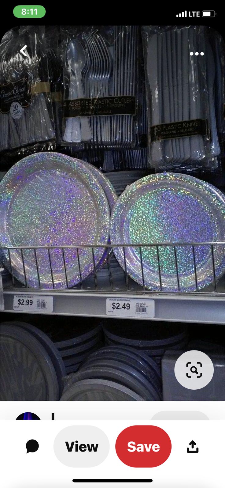 plates are on display in a store with holographics and plastic wrap around them