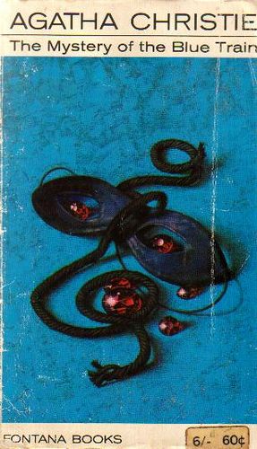 an old book cover with a black snake on it's face and red eyes