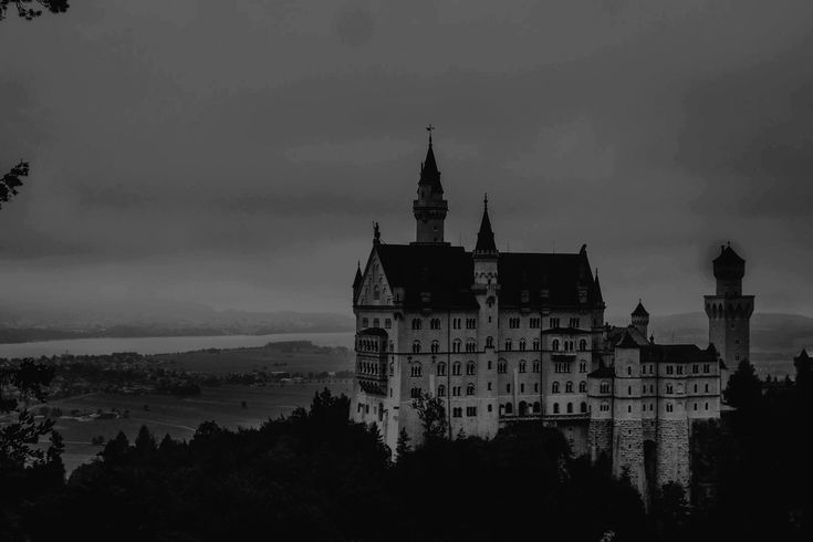 an old castle is shown in black and white