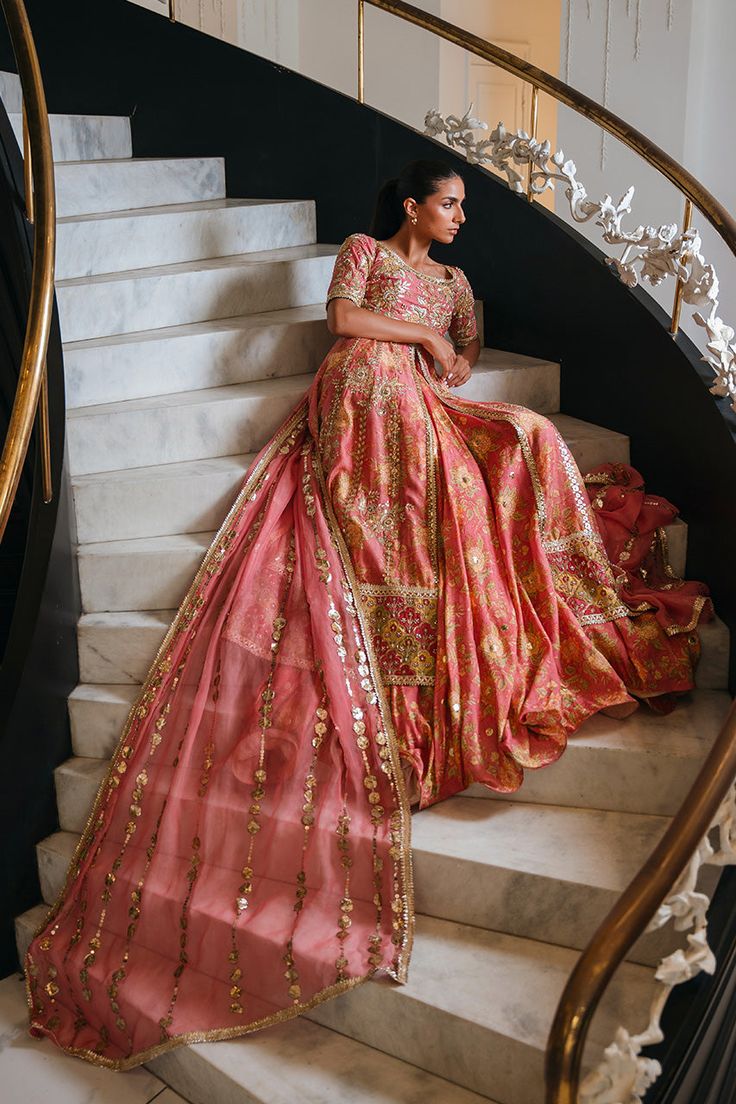 Ayda Anarkali Jamawar Sets For Reception, Floor-length Raw Silk Dupatta With Naqshi Detail, Diwali Raw Silk Dress With Naqshi Detailing, Diwali Raw Silk Dress With Naqshi, Festive Sharara With Naqshi For Reception, Traditional Drape Lehenga With Dabka In Jamawar, Eid Gown With Jamawar Fabric And Traditional Drape, Unstitched Jamawar Wedding Gown, Wedding Dress With Sheer Dupatta And Jamawar Material