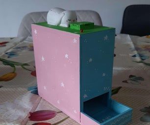 a pink and blue box sitting on top of a table