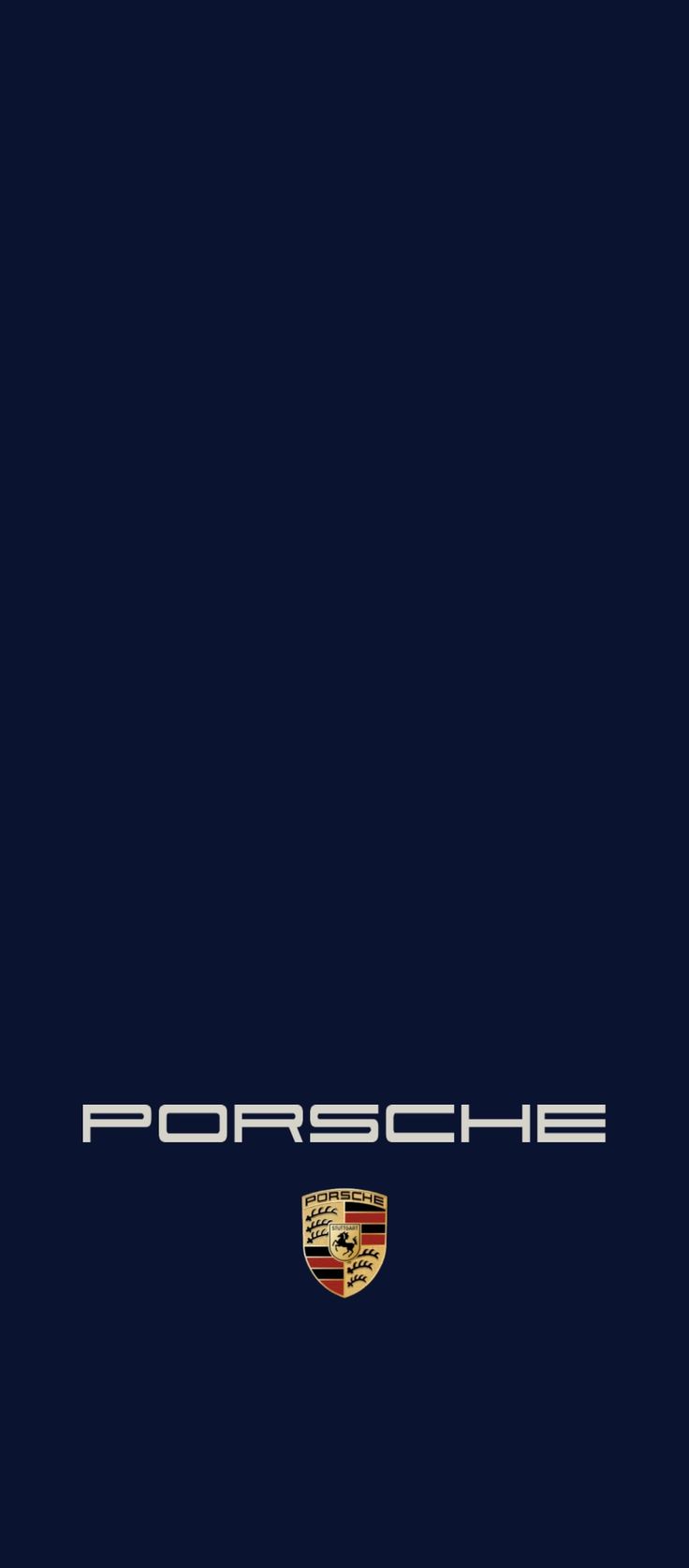 the porsche logo on a dark blue background