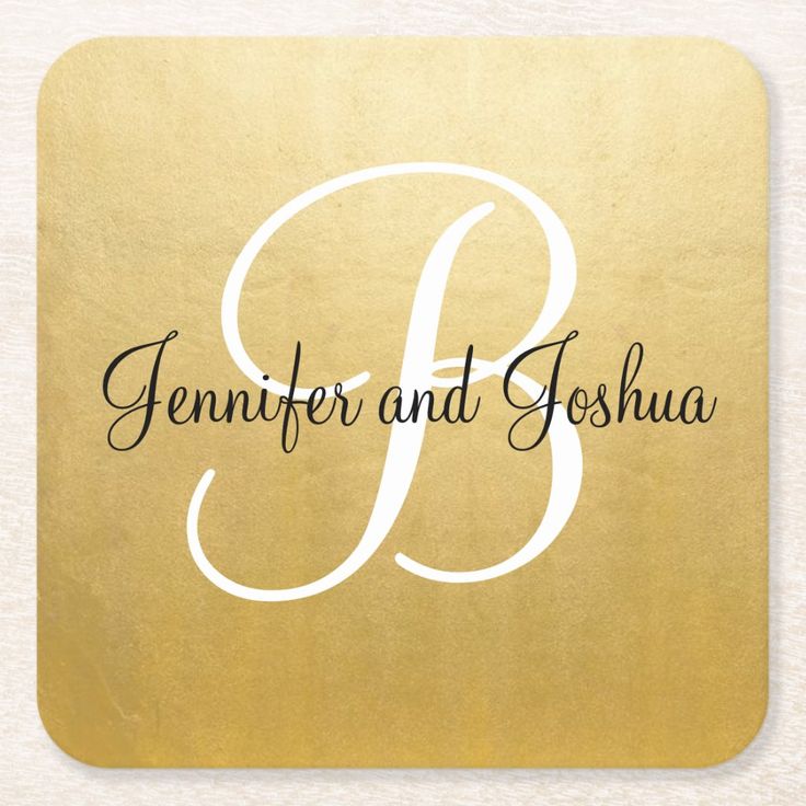 a square coaster with the letter f in black ink on gold paper, and an elegant monogrammed font