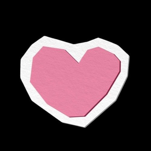 a pink heart cut out of paper on a black background in the shape of a circle