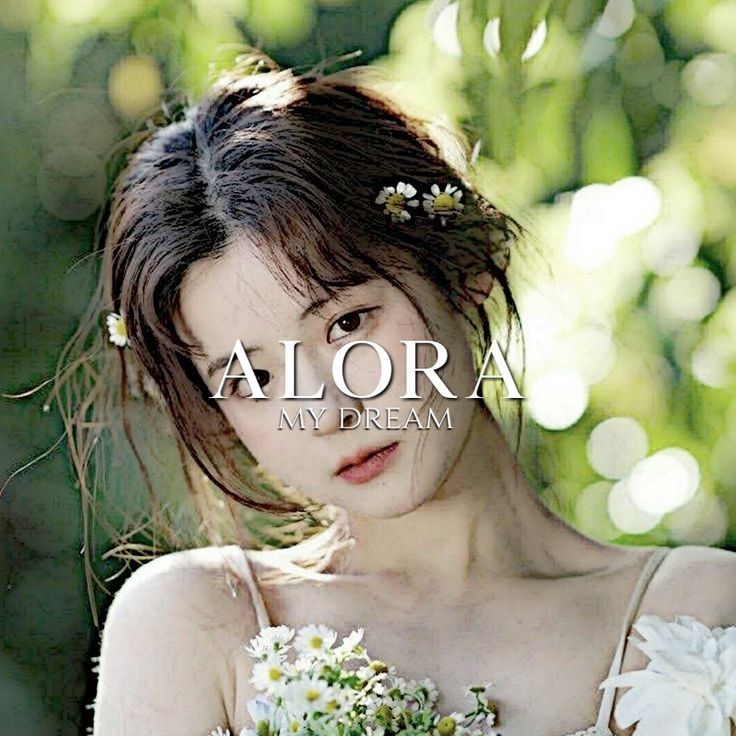 a young woman holding a bouquet of flowers in her hand with the caption alora my dream