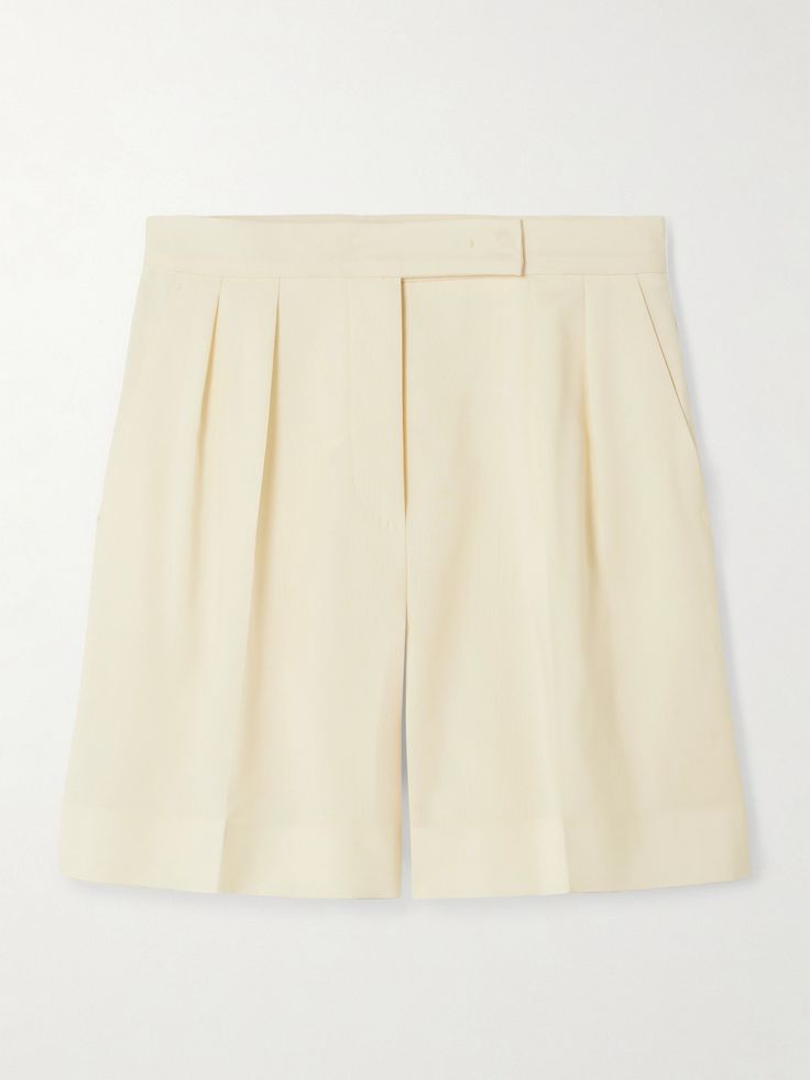 Max Mara's 'Priamo' shorts are neatly tailored from ivory silk and have sharp pleats along the front waistband. They make a refined set when worn with the coordinating 'Elegia' blazer.