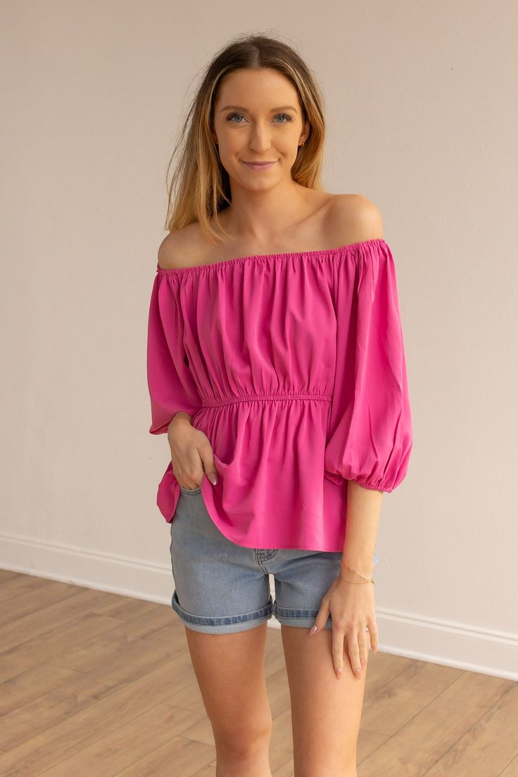 The Bold Blossom Pink Peasant Blouse is a charming and versatile off-the-shoulder top that brings a touch of bohemian flair to your wardrobe. With its relaxed and flowy silhouette, this blouse offers a casual yet stylish look. Fit: Relaxed Material: 100%PolyesterOur model is wearing: Size Small Summer Flowy Blouse With Smocked Bodice, Bohemian Top With Smocked Bodice For Brunch, Bohemian Smocked Bodice Blouse For Beach, Bohemian Blouse With Smocked Bodice For Vacation, Bohemian Blouse With Smocked Bodice For Beach, Bohemian Tops With Elastic Neckline For Spring, Bohemian Blouse With Smocked Bodice For Day Out, Bohemian Puff Sleeve Peasant Top For Brunch, Bohemian Smocked Bodice Peasant Top For Brunch